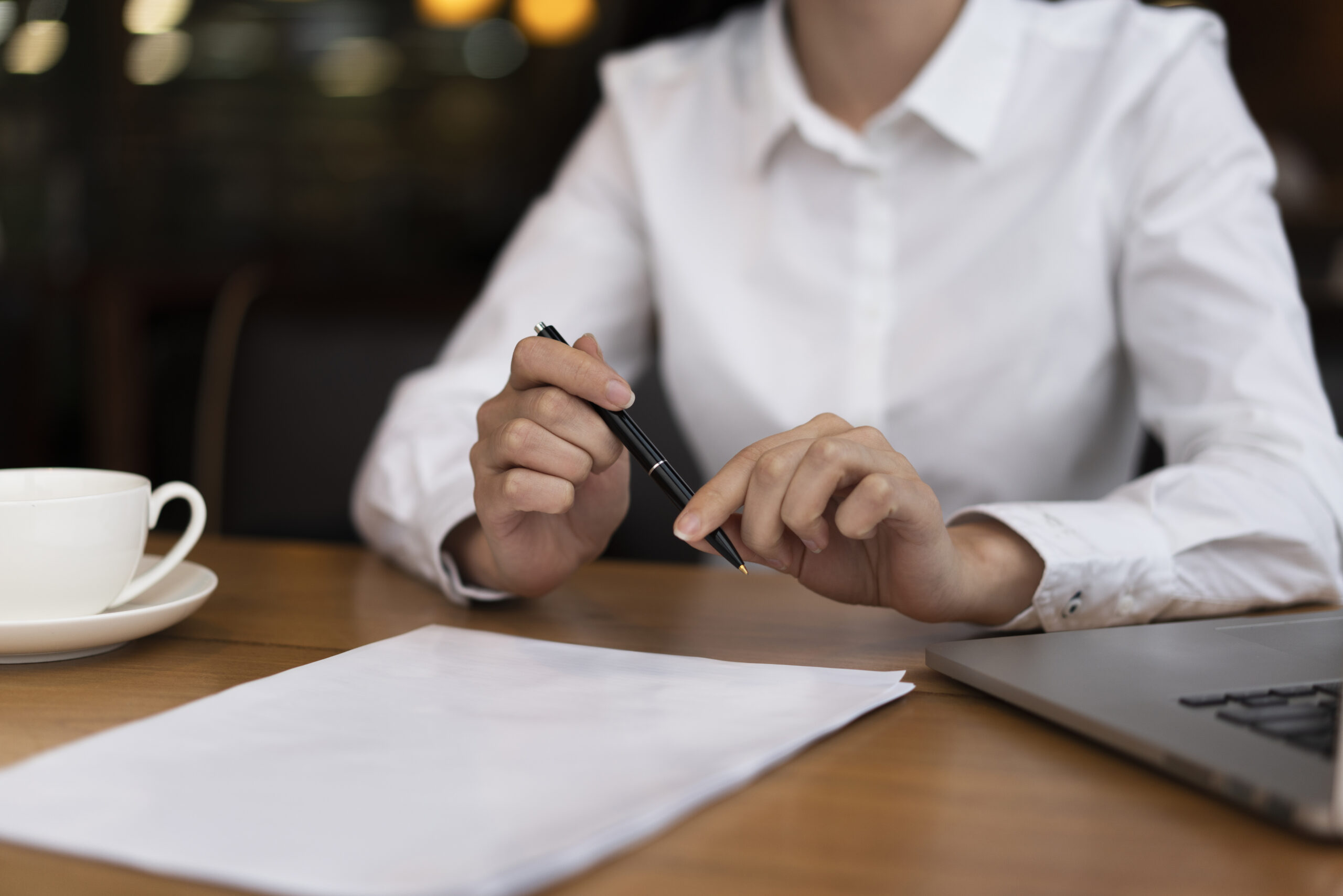 businessman-ready-sign-papers-office