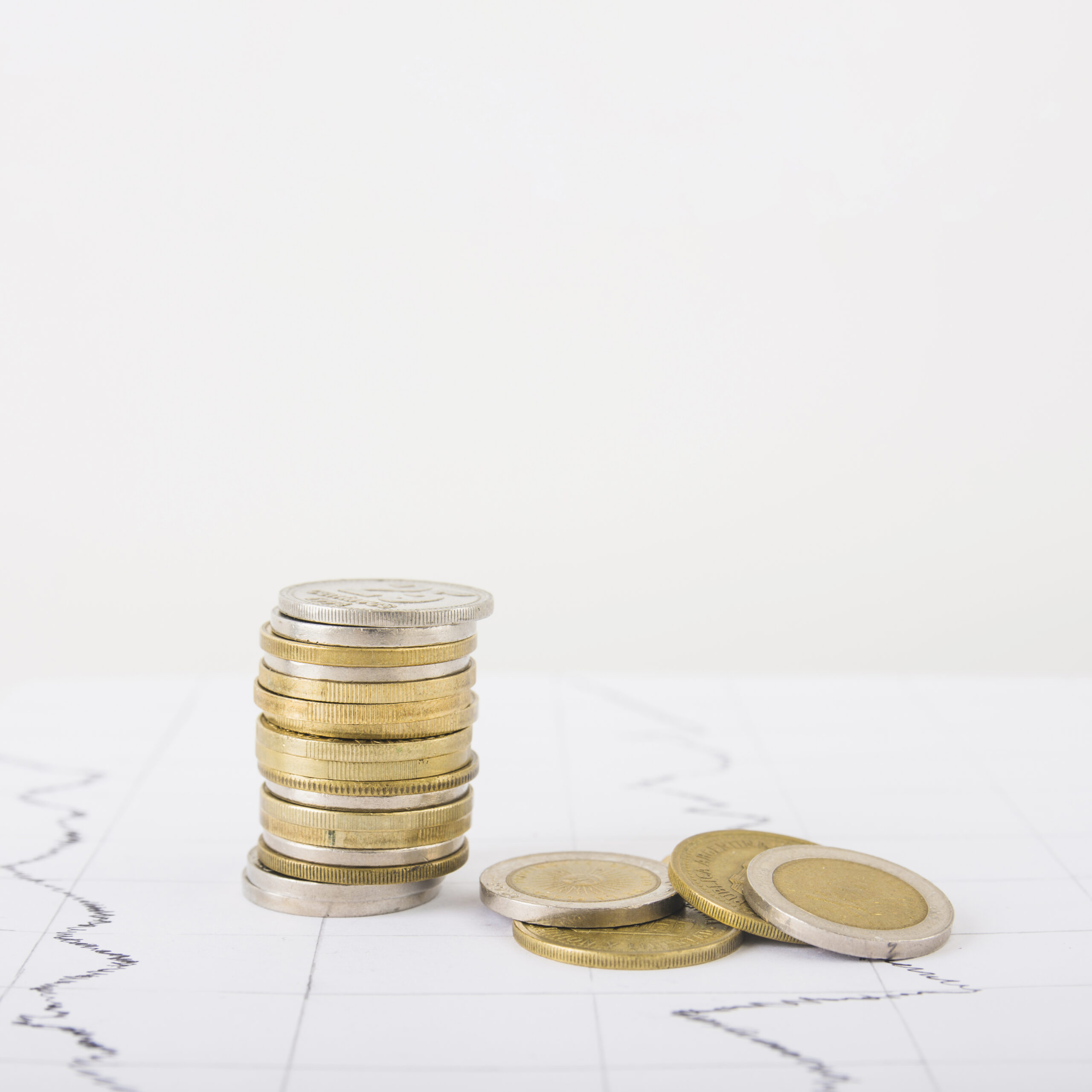 coins-stack-white-table
